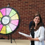 female student with prize wheel