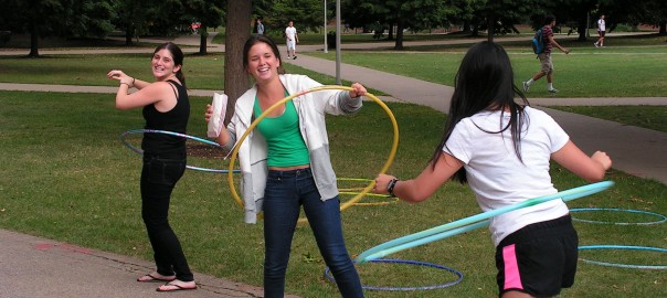 female students hula hooping